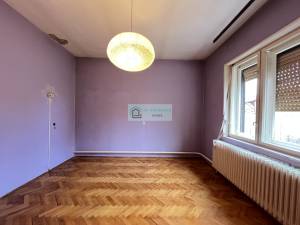 A Garden-Framed Spacious Family Home with Character and Potential for Sale in a Charming Town