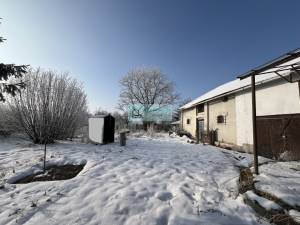 Versatile Brick Country Home with Large Garden and Multiple Outbuildings