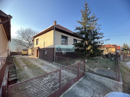 A two-storey house in good condition with a well maintained plot for sale in North-Hungary