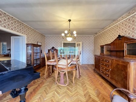 A Garden-Framed Spacious Family Home with Character and Potential for Sale in a Charming Town
